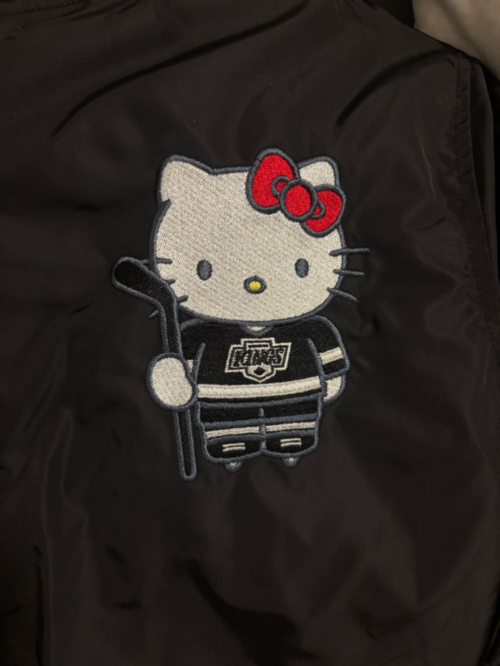 Hello Kitty x NHL Los Angeles Kings Patch Jacket - Black with Red Bow